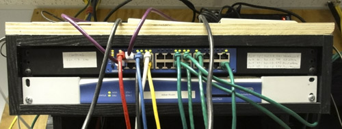 New LAN switch and with reorganized WAN router, modems, and gateways. AFTER photo of new LAN switch and with reorganized WAN router, modems, and gateways.
